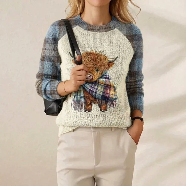 Deborah – Light Blue & Cream Highland Cow Jumper